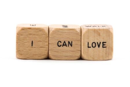I Can Love phrase formed from wood blocksの写真素材