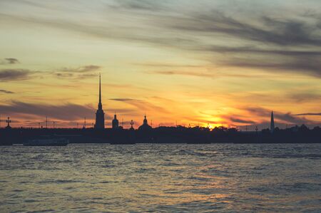 Silhouette of Peter and Paul Fortress in Saint Petersburg at sunsetの写真素材