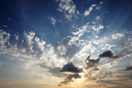 The dramatic cloudy blue sky before sunset.