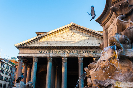 pigeons flying on the mountain in front of pantheon in romeのeditorial素材