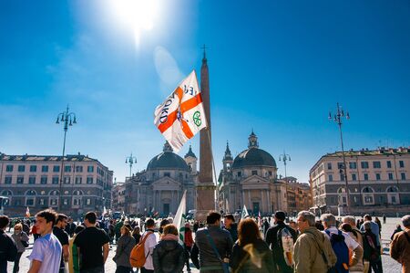 Rome, Italy - 28 february 2015: flag of Lega Nord political party wave Popolo square in Rome in front of christian churches and crossのeditorial素材