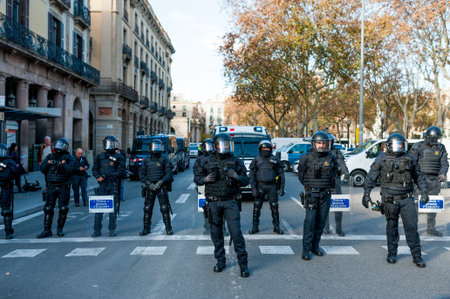 Barcelona, Spain - 21 decemer 2018: young catalan independists, called Cdr, clash with police during...