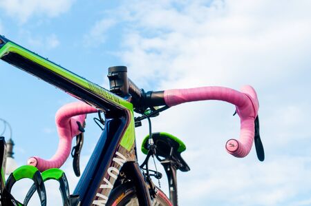 Trieste, Italy - 30 may 2014: close up of professional colombian biker Nairo Quintana bycicle handle bar with traditional pink color, symbol of winnerのeditorial素材