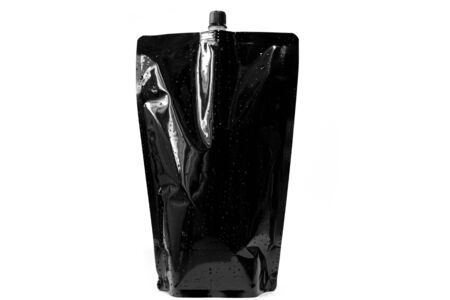 black doypack spout pouch, liquid packaging pouch with plug on white backgroundの写真素材