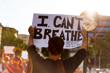Barcelona, spain - 1 june 2020: white man marching with black lives matter movement holding i can't...