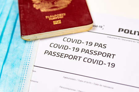 covid vaccine passport concept. travel and tourism during covid19 pandemic with restrictions and lockdown to stop spread the corona virus. hope is for vaccine to allow holidaysのeditorial素材