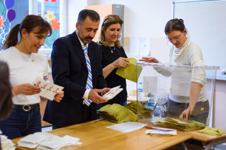 Istanbul, Turkey - 14 May 2023: Voting assistance officers are seen taking out ballot papers during...