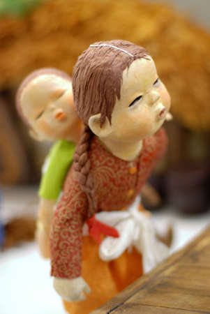 Korean Folk Art, miniature Clay dolls dressed in traditional costumeの写真素材