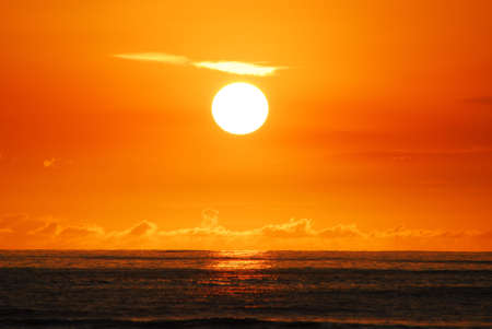 Sunset at Wakiki Beach in Honolulu, Hawaiiの写真素材