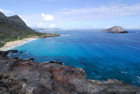 Tropical beach scene on a sunny day iin Oahu, Hawaiiの写真素材