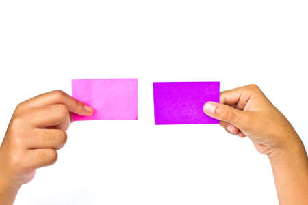 Blank color card in two handsの写真素材