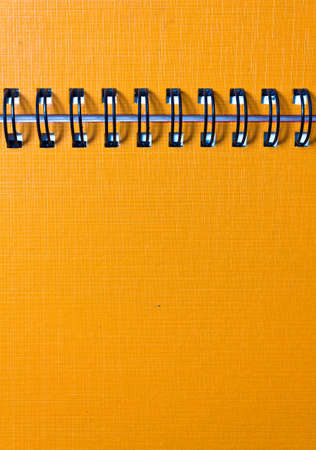 The cover of the orange notebook, closeupの写真素材