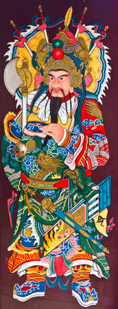 chinese art on the temple door in Thailandの写真素材