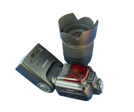 flash & lens for dslr camera isolated on white with clipping pathの写真素材