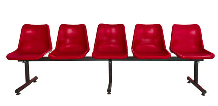 red plastic chairs at the bus stop isolated on whiteの写真素材
