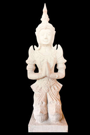 Thai statue in the temple on black background with clipping pathの写真素材
