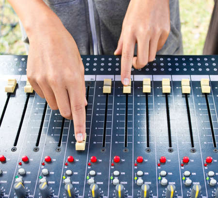 On a photo mixing desk. Close up photosの写真素材