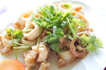 Fried fresh squid in garlic , Thai food