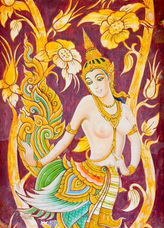 Thai art on the wall in the public temple of Thailandのeditorial素材