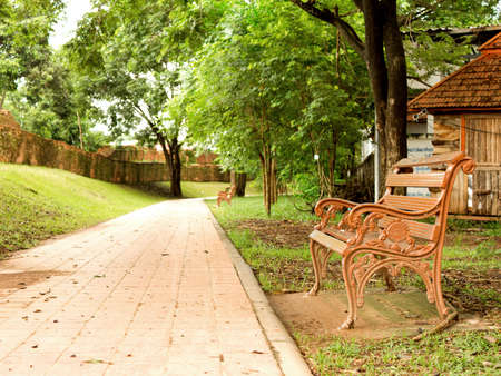 brown bench in the park, Thailandの写真素材