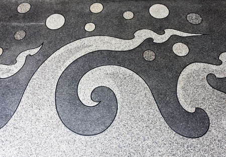 Thai pattern style on gravel stone floor interior decorationの写真素材
