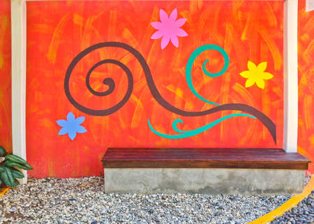 bench in the park and beautiful painting wallの写真素材