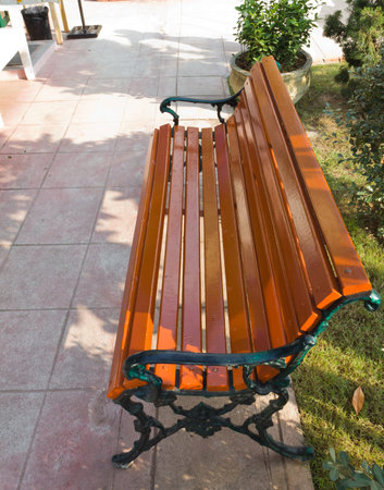 wooden bench in the park, Thailandの写真素材