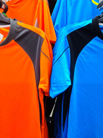 closeup of some clothes hanging on a railの写真素材