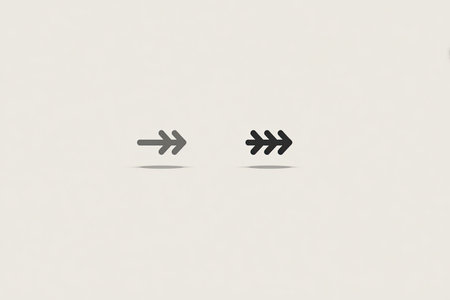 Two simple, stylized arrows pointing to the right, in a light gray and black tone, are suitable for use as a navigation element or an icon in various digital applications or designs.の素材