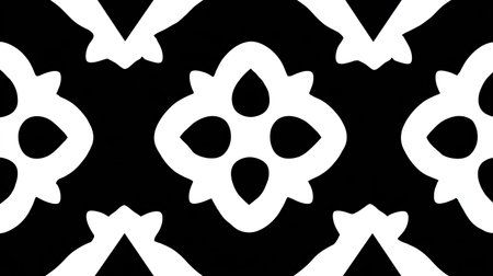 A repeating abstract pattern of organic white shapes against a black backdrop.の素材