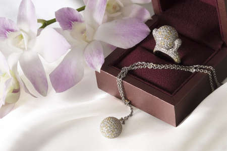 Valuable gift on white silkの写真素材