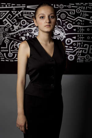 portrait of a girl on a background of abstract drawingの写真素材