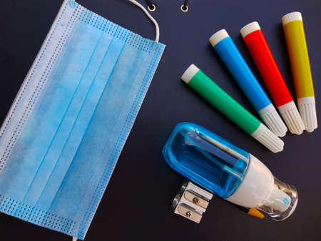 Back to school with mask and hydro-alcoholic gelの写真素材