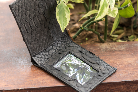 Empty handmade snakeskin python wallet.の写真素材