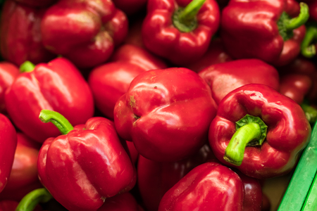 Fresh red organic sweet bell peppers on the farmer market on a tropical island Bali.の写真素材