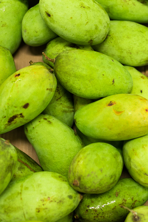 Fresh organic mango in market of tropical Bali island.の写真素材