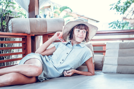 Beauty enjoying her summer vacation at luxury villa. Summer holiday idyllic. Bali island.