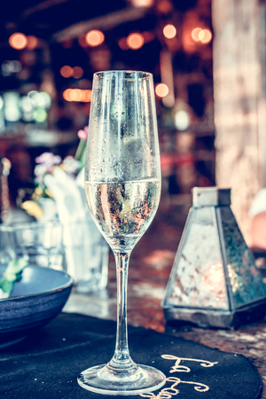 Close up of a glass of champagne in cafe, Bali island, Indonesia.の写真素材