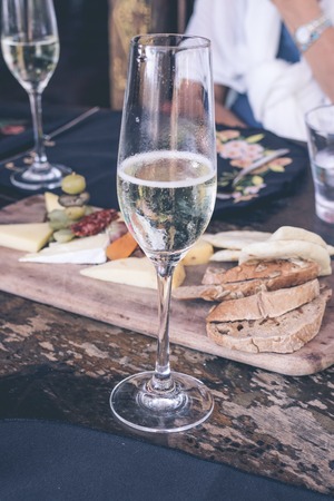 Close up of a glass of champagne in cafe, Bali island, Indonesia.の写真素材