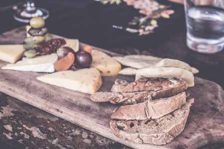 Cheese plate with several varieties of cheese in the restaurant of Bali island, Indonesia.の写真素材