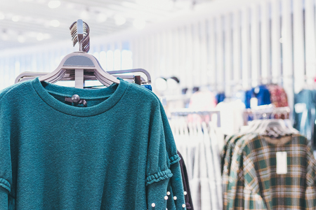 Woman clothes in the store. Fashion store. Shopping mall.の写真素材