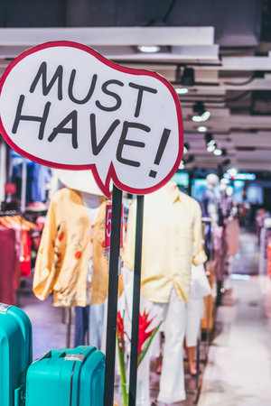 Must Have placard in the shopping mall. Fashion store sign. Bali island.の写真素材