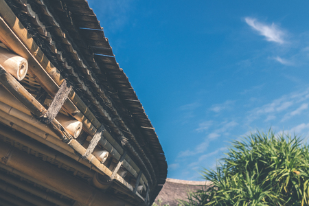 Bamboo roof against a blue sky. Bali island.の写真素材