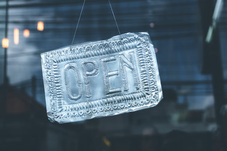 Open sign in the retail store. Bali island.