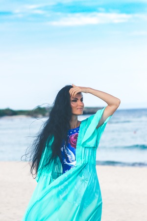 Sexy young woman posing on the tropical beach of Bali island, Indonesia. Asia.の写真素材