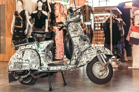 BALI, INDONESIA - FEBRUARY 17, 2018: Vintage scooter Vespa stands in the store.のeditorial素材