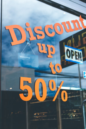 Sale and discount sign in the shopping mall in Asia.