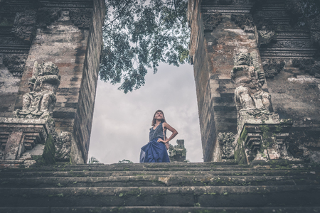 European woman in balinese temple. Bali island.の写真素材