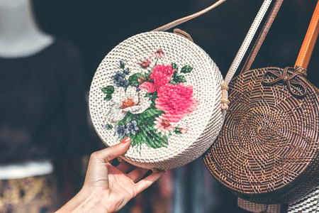 Rattan round bags at a street shop. Bali, Indonesia.の写真素材