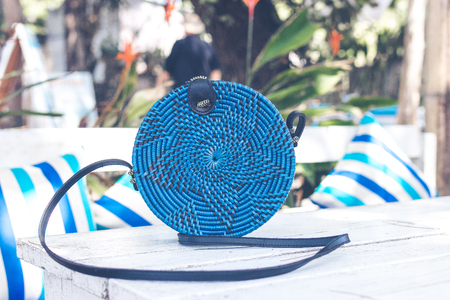 Handmade natural organic rattan handbag. Tropical island of Bali. Eco-bag concept. Ecobags from Bali.の写真素材